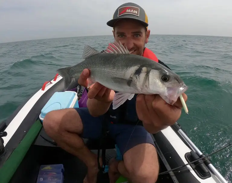 Man in Hydrus Holding a fish