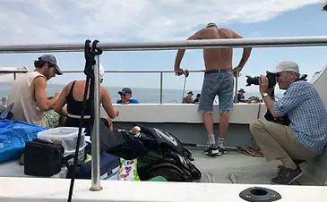 inflatable boat fishing assisting filming of vindication swim