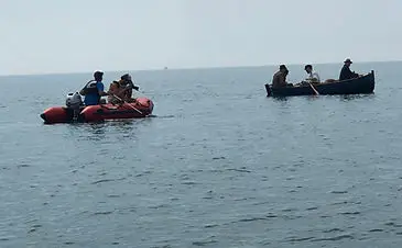 inflatable boat fishing assisting filming of vindication swim